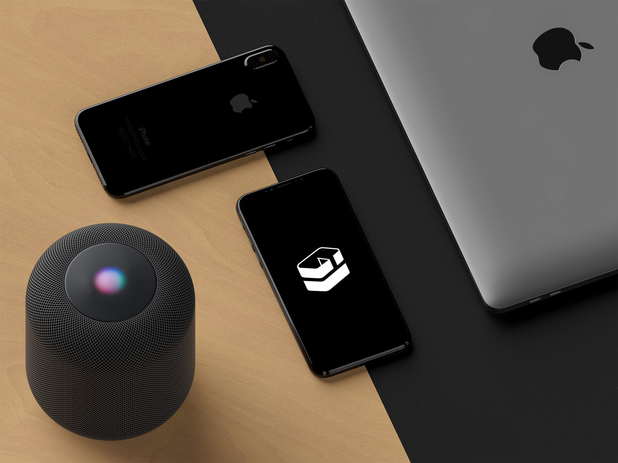 Moderne Apple-B2B-Hardware: MacBook, iPhone und Smart Speaker im Einsatz.